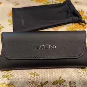 Authentic Valentino black magnetic glasses case and dust bag.
